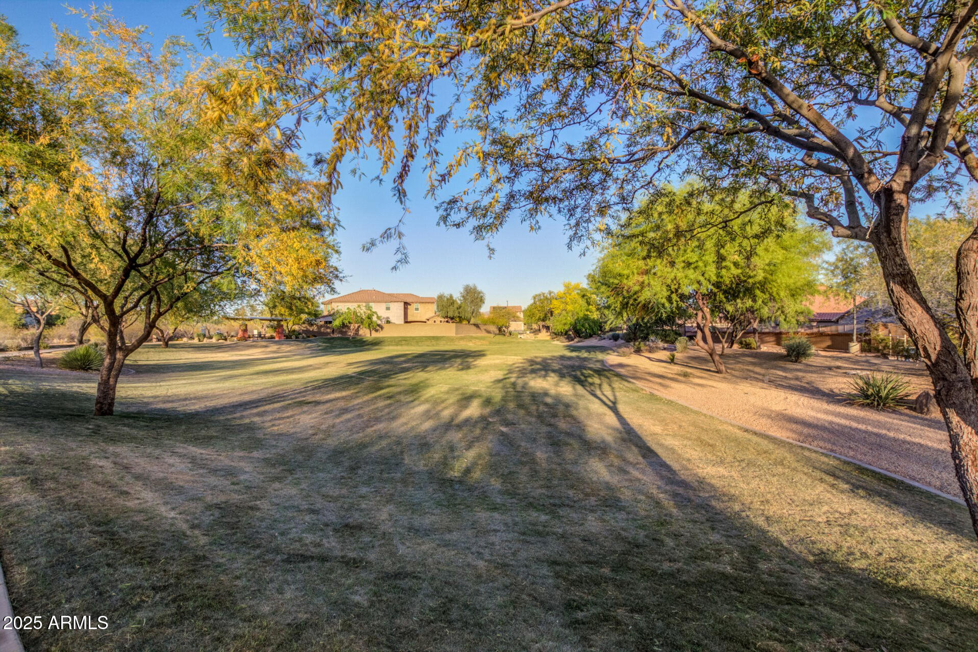 20660 North 40th Street, Unit 2120 Phoenix, AZ 85050 - Photo 36 of 39 a view of road with large trees