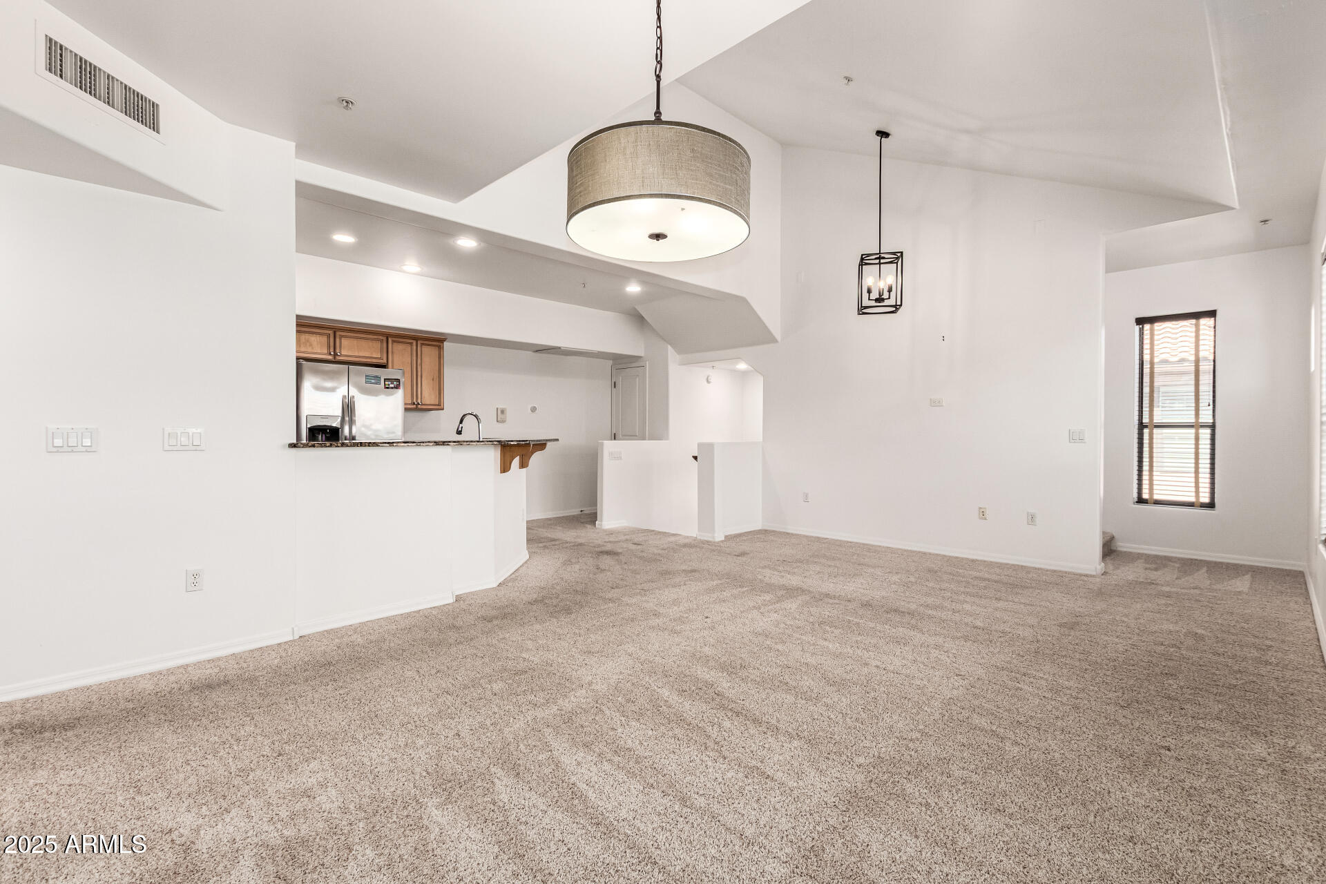 20660 North 40th Street, Unit 2120 Phoenix, AZ 85050 - Photo 4 of 39 a view of a kitchen with a sink and a window