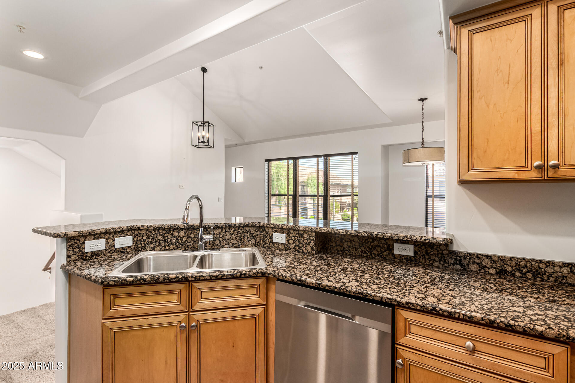 20660 North 40th Street, Unit 2120 Phoenix, AZ 85050 - Photo 8 of 39 a kitchen with granite countertop a sink and a window