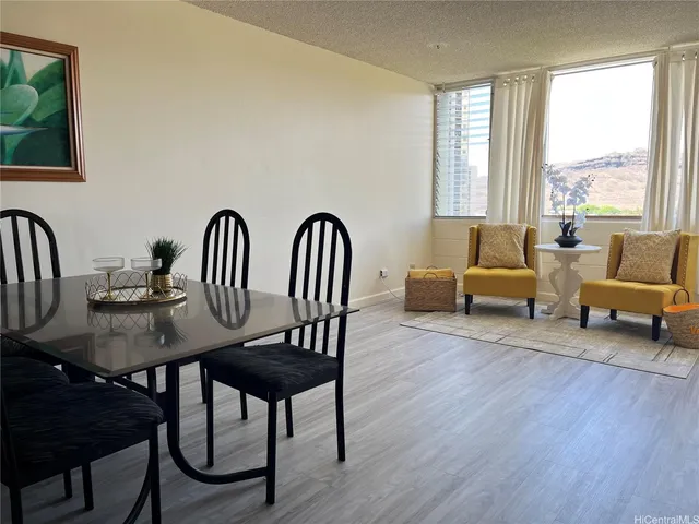a view of a livingroom with furniture and window