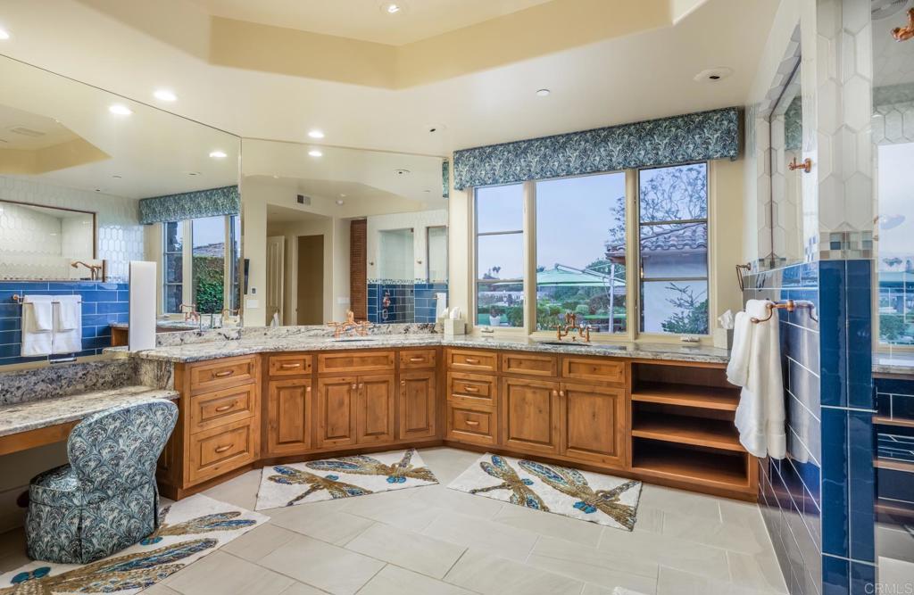 4843 La Jacaranda Rancho Santa Fe, CA 92067 - Photo 24 of 61 a large bathroom with a large tub and sink