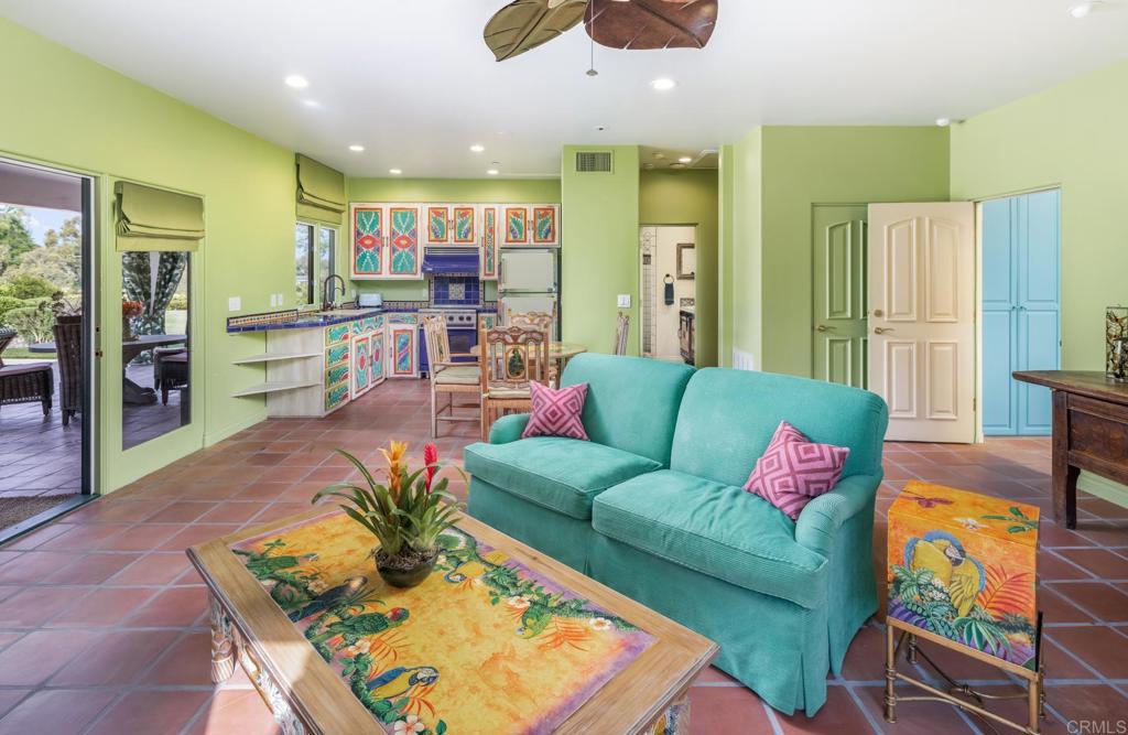4843 La Jacaranda Rancho Santa Fe, CA 92067 - Photo 50 of 61 a living room with furniture kitchen view and a large window
