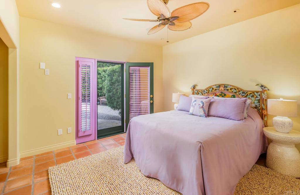 4843 La Jacaranda Rancho Santa Fe, CA 92067 - Photo 54 of 61 a bedroom with a bed and a window