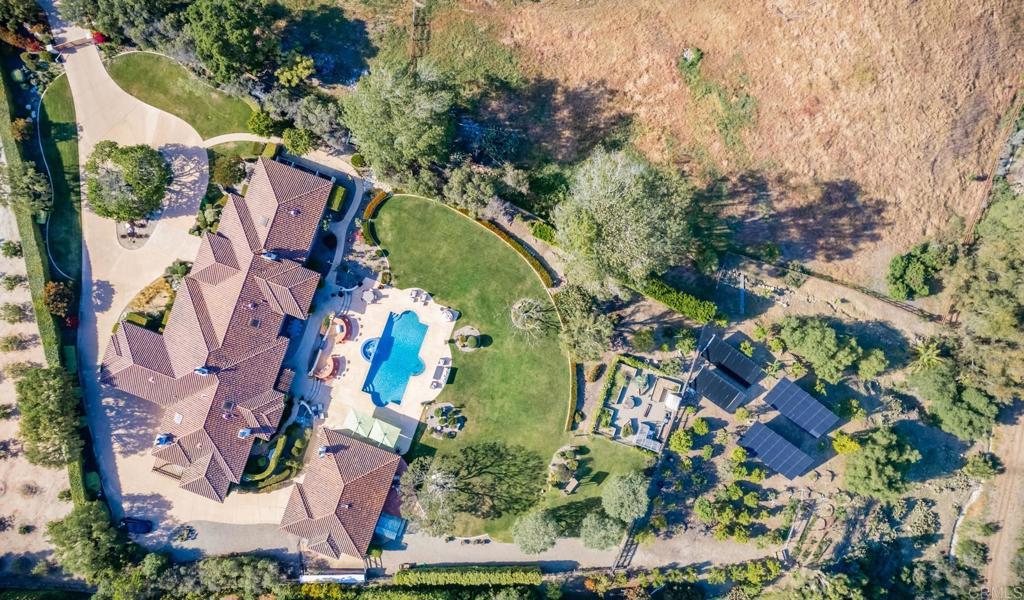 4843 La Jacaranda Rancho Santa Fe, CA 92067 - Photo 6 of 61 an aerial view of residential house with outdoor space and swimming pool