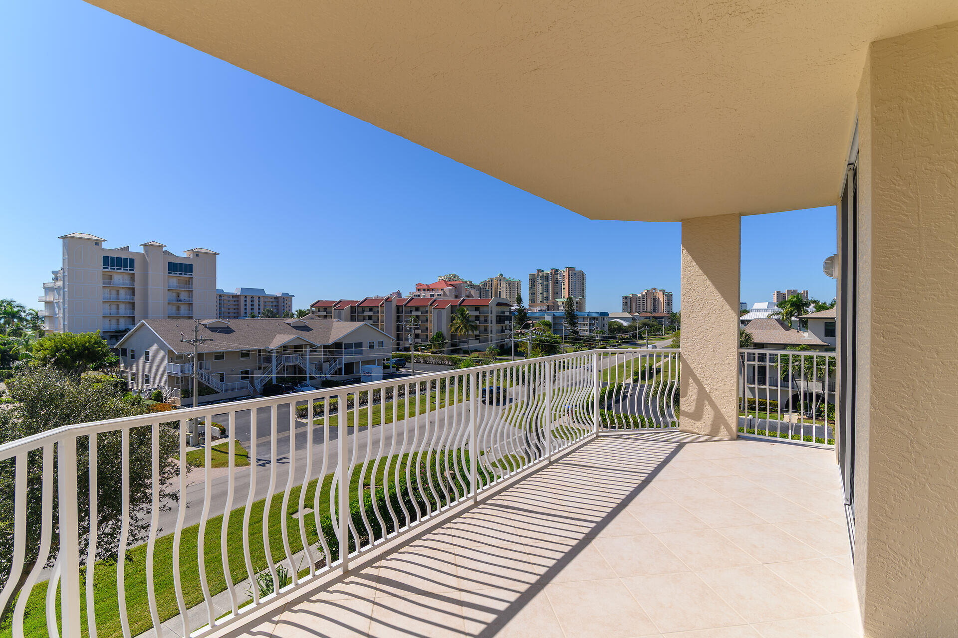 1111 Swallow Avenue, Unit 1401 Marco Island, FL 34145 - Photo 22 of 36 a balcony with city view