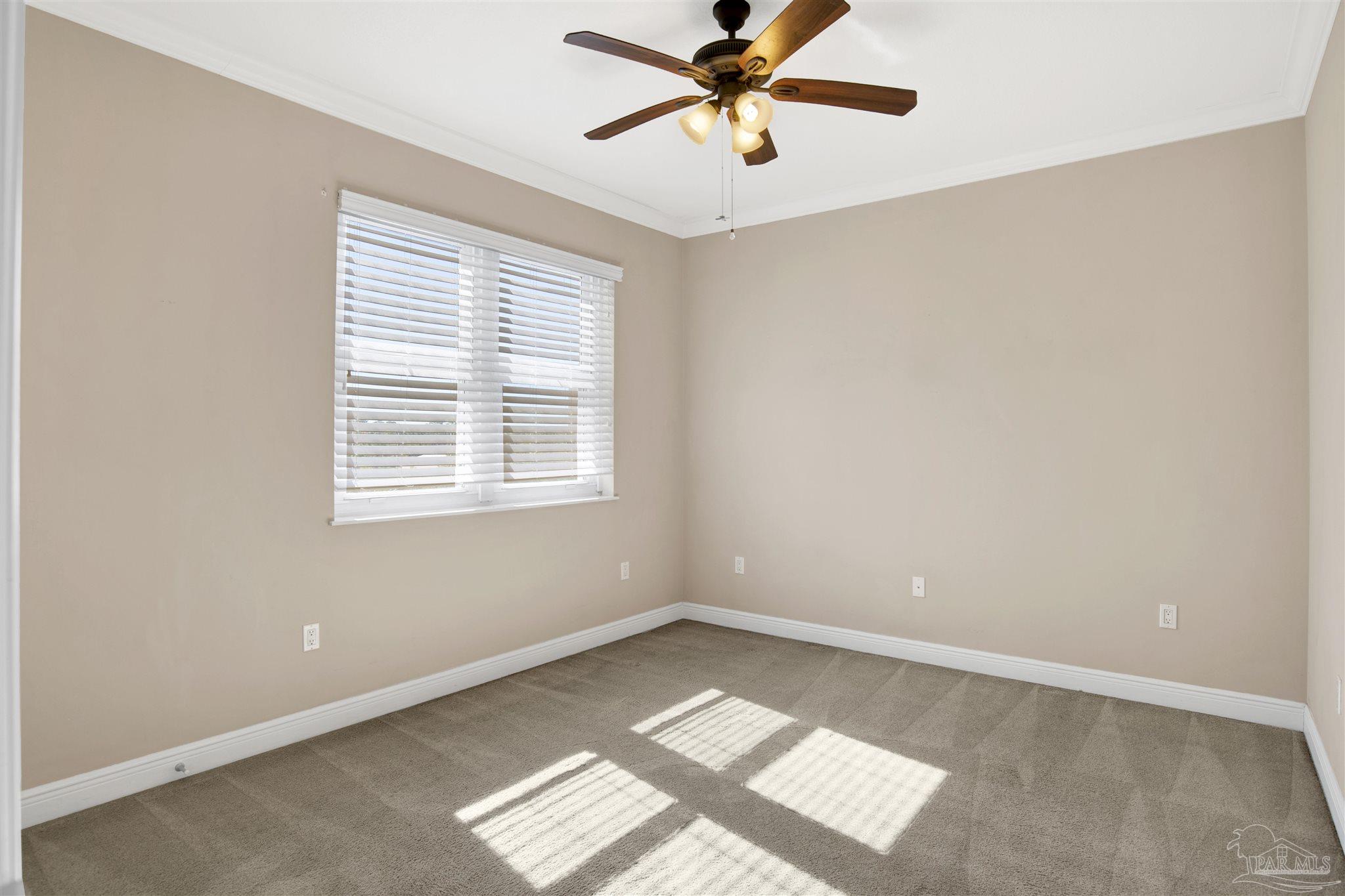 612 Lost Key Drive, Unit 401B Pensacola, FL 32507 - Photo 14 of 34 a view of an empty room with a window