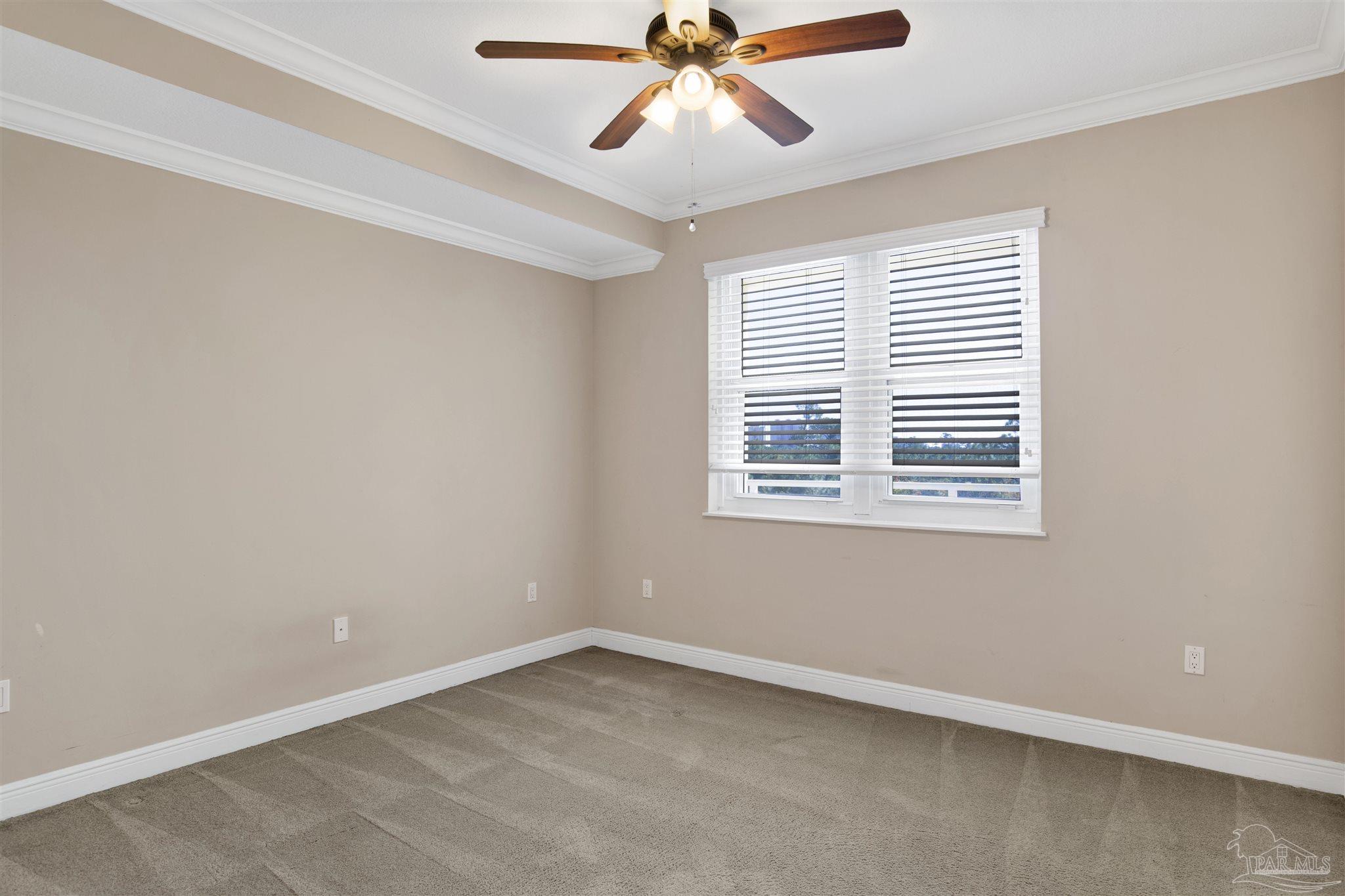 612 Lost Key Drive, Unit 401B Pensacola, FL 32507 - Photo 16 of 34 a view of an empty room with a window