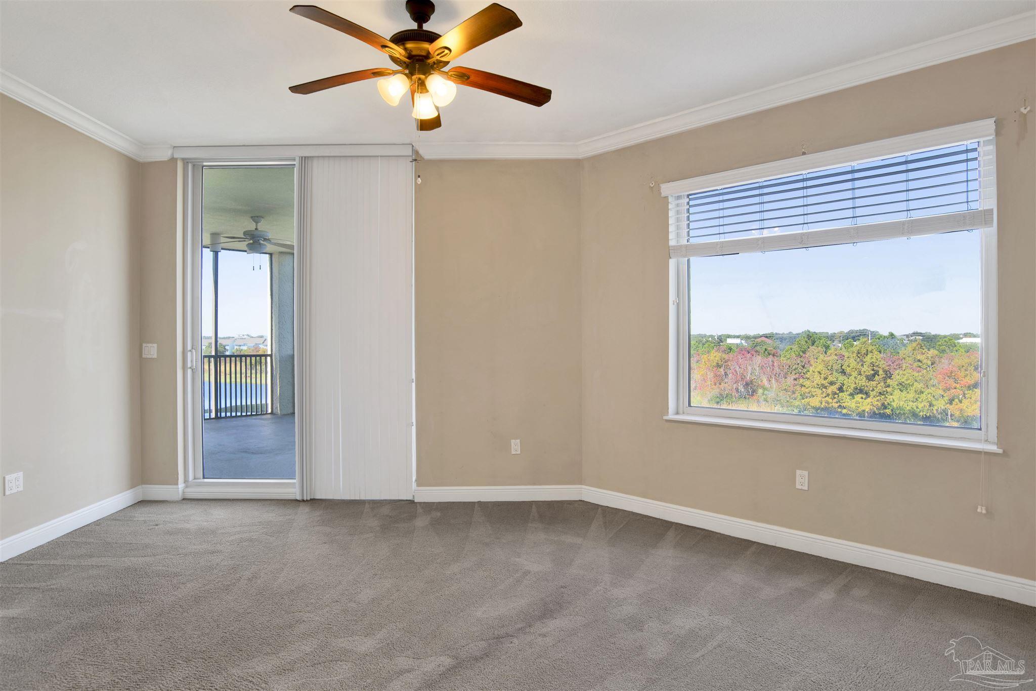 612 Lost Key Drive, Unit 401B Pensacola, FL 32507 - Photo 23 of 34 a view of an empty room with a window