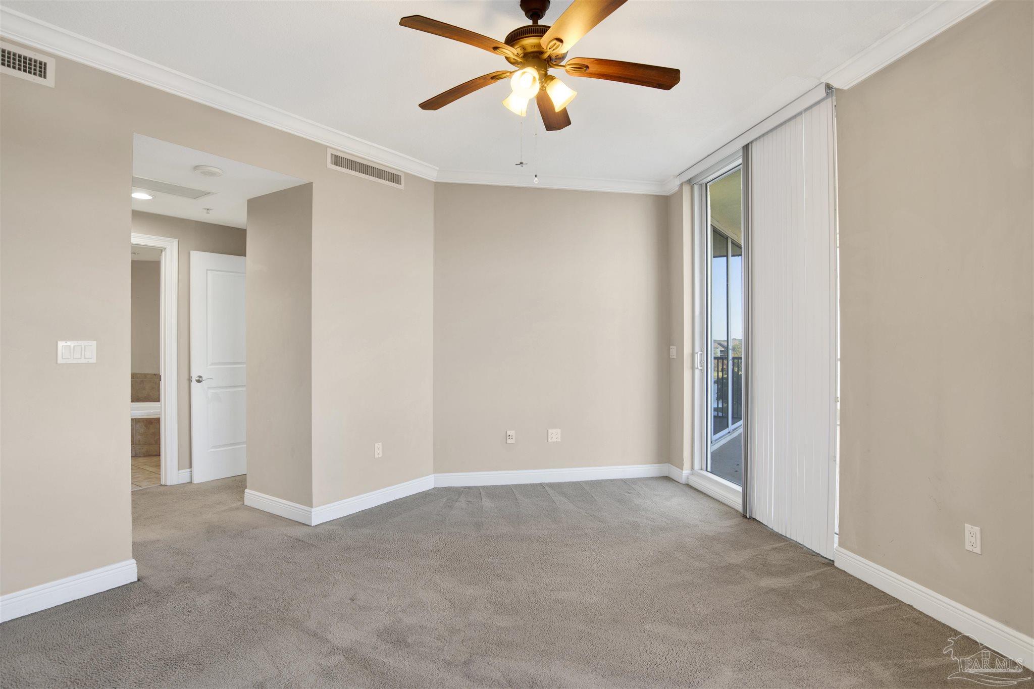 612 Lost Key Drive, Unit 401B Pensacola, FL 32507 - Photo 24 of 34 a view of a livingroom with a chandelier fan