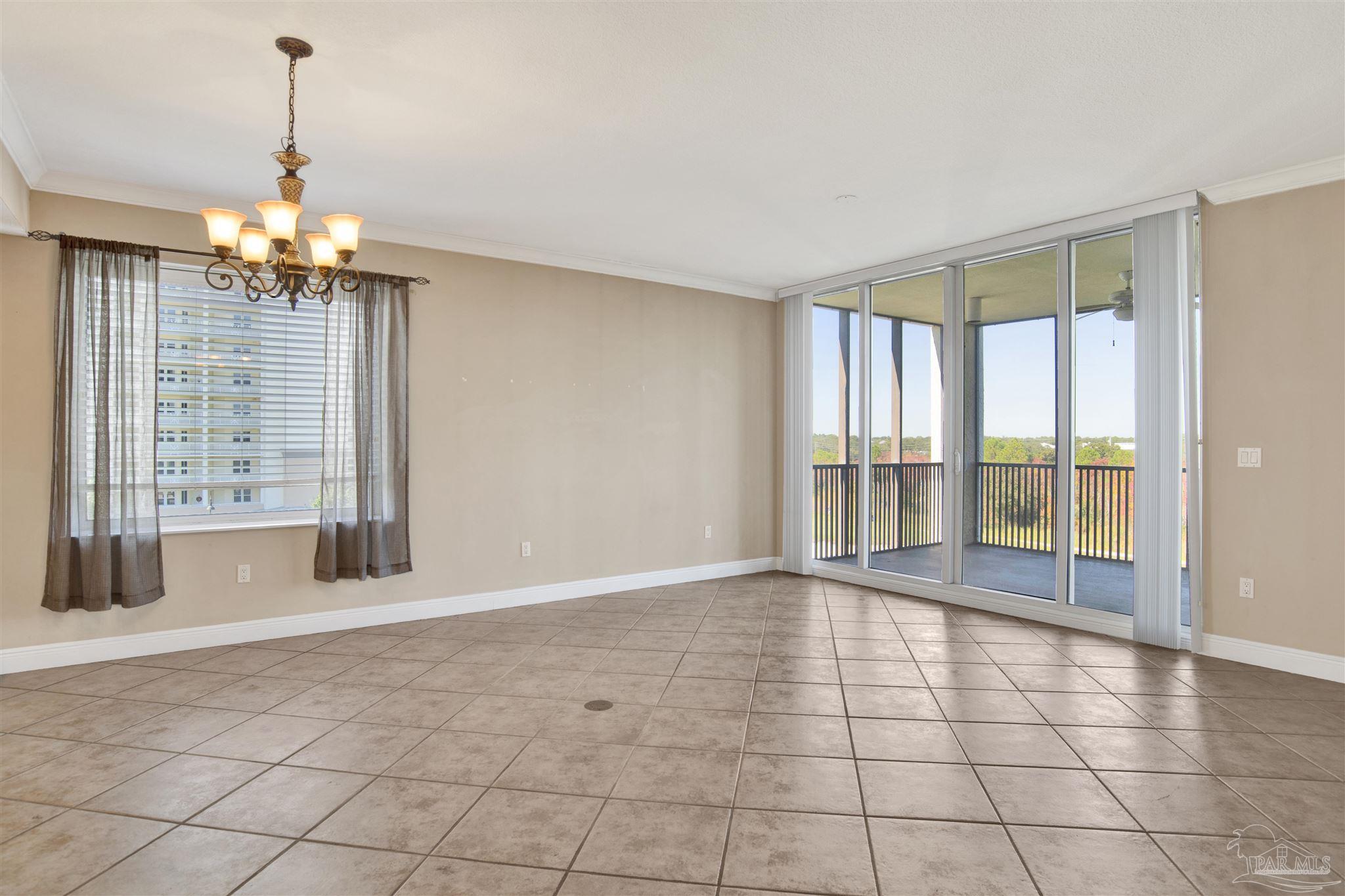 612 Lost Key Drive, Unit 401B Pensacola, FL 32507 - Photo 6 of 34 a view of an empty room with a window