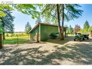 a backyard of a house with lots of green space