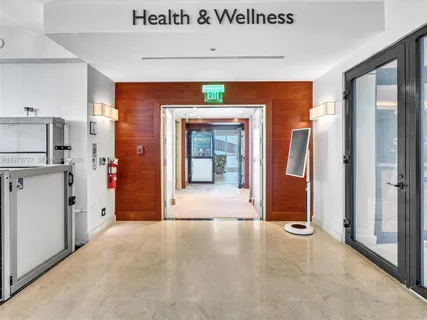 a very nice looking living room with a large window