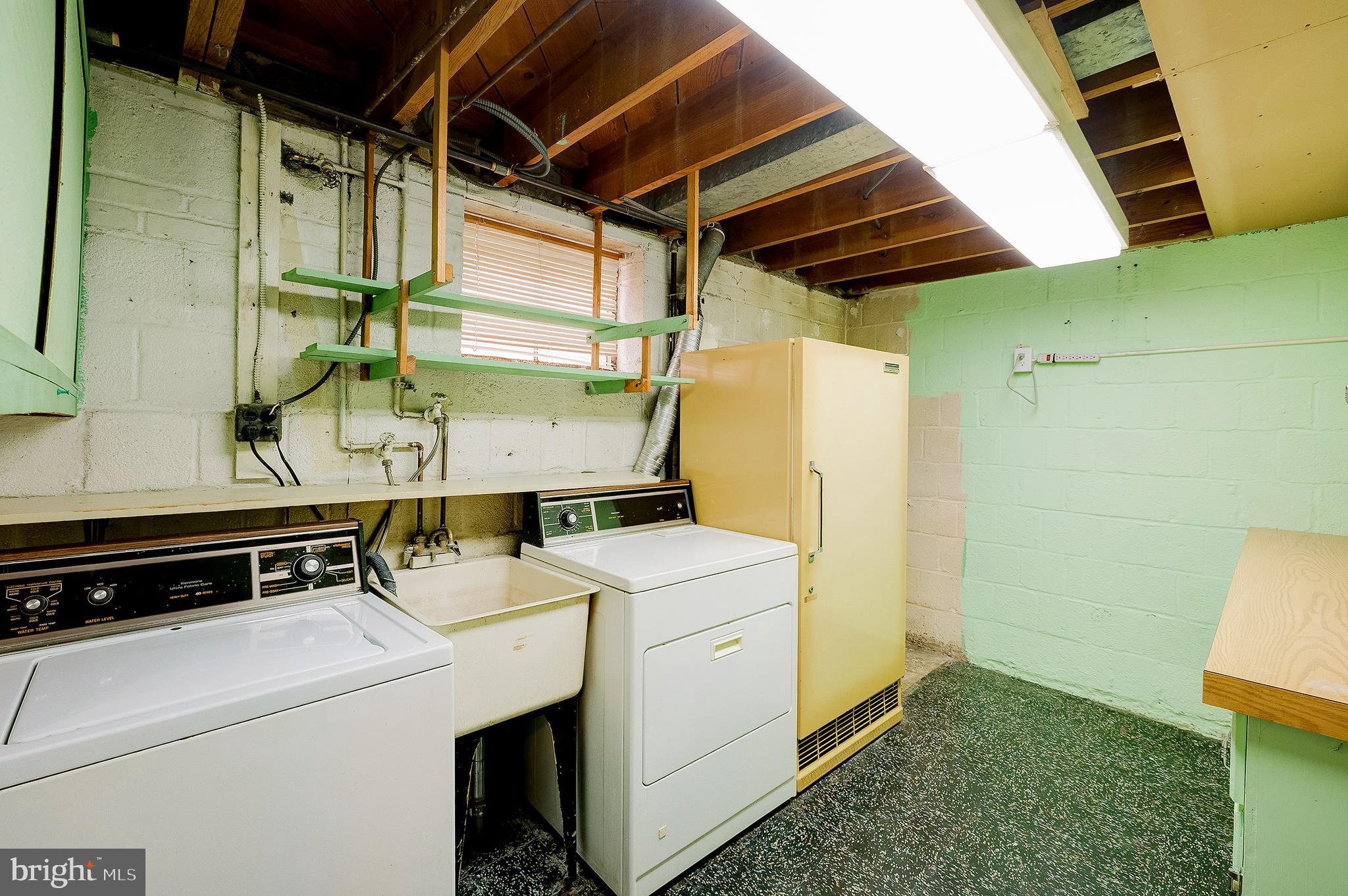 6159 1st Street Northeast Washington, DC 20011 - Photo 25 of 28 a utility room with dryer and washer
