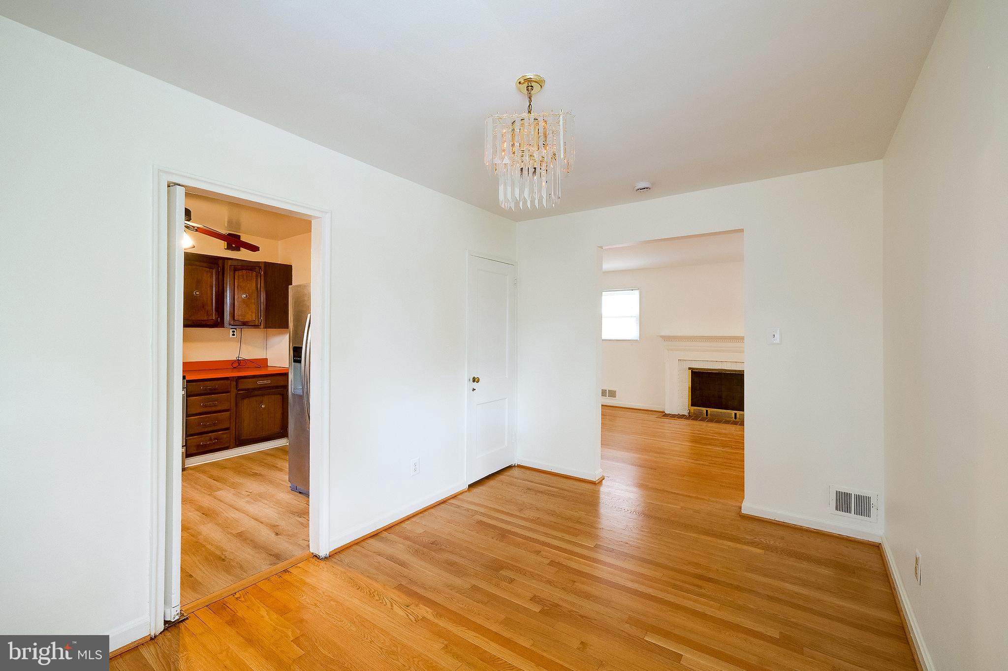 6159 1st Street Northeast Washington, DC 20011 - Photo 8 of 28 a view of empty room with wooden floor