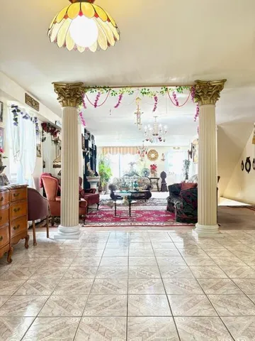 a view of a chairs and table in a patio