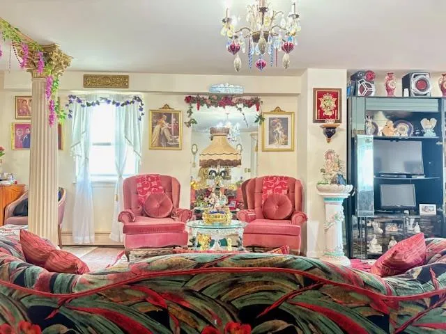 a bedroom with bed and furniture