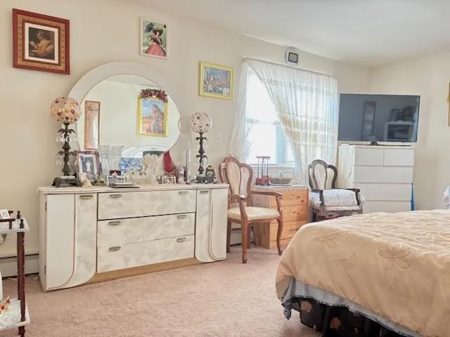 a view of a garage with rack and bicycle
