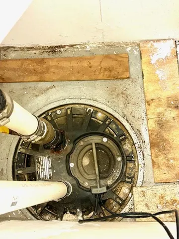 a utility room with multiple dryer and washer