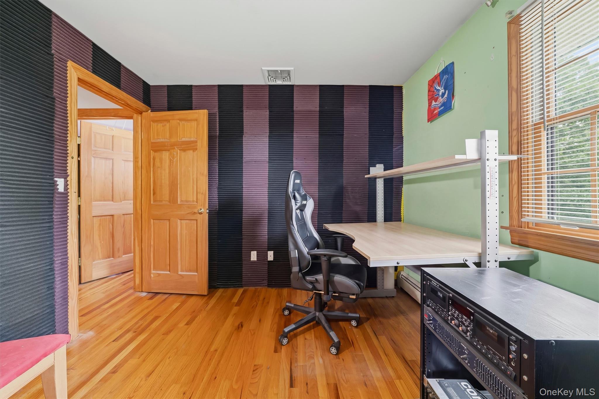 318 Beattie Road Washingtonville, NY 10992 - Photo 20 of 42 a view of a workspace with furniture and a window