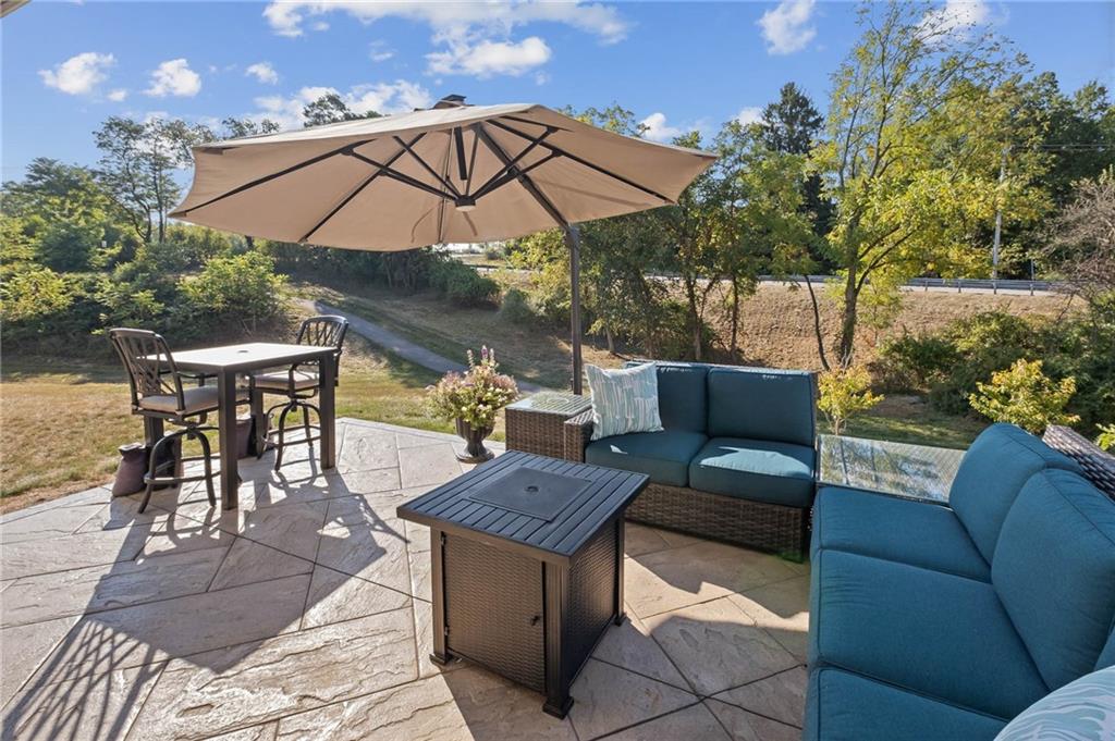 7208 Chestnut Way Gibsonia, PA 15044 - Photo 35 of 50 Backyard patio, great for soaking up the sun.