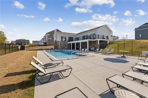 a view of a patio with swimming pool