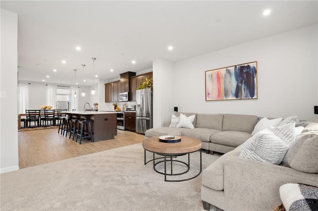 7208 Chestnut Way Gibsonia, PA 15044 - Photo 5 of 50 Seamless connection to the kitchen from the living room.