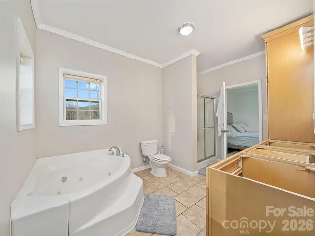 a bathroom with a bathtub and a sink