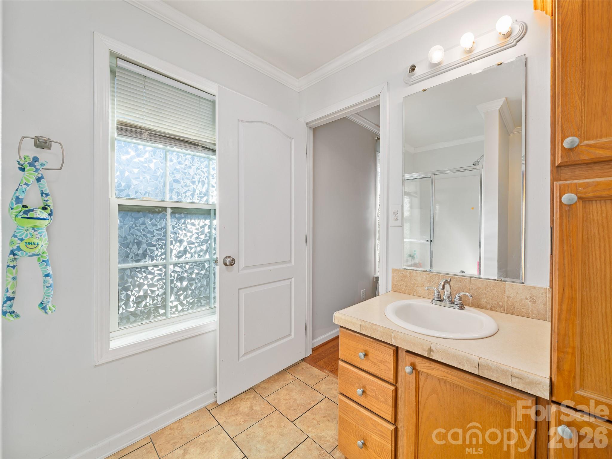 221 Creed Pitman Road Spruce Pine, NC 28777 - Photo 20 of 27 a bathroom with a sink double vanity and a mirror
