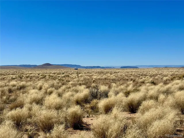 a view of an outdoor space and mountain view