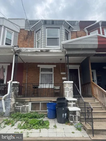 a front view of a house with garage
