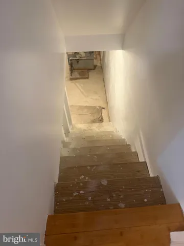 a view of parking garage with cars