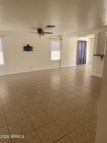 a view of empty room with windows