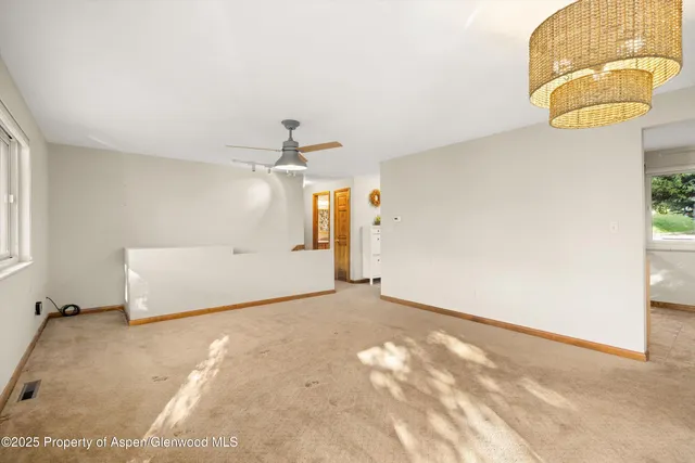 a view of a room with a window