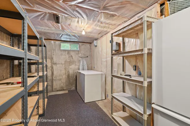 a view of storage and utility room