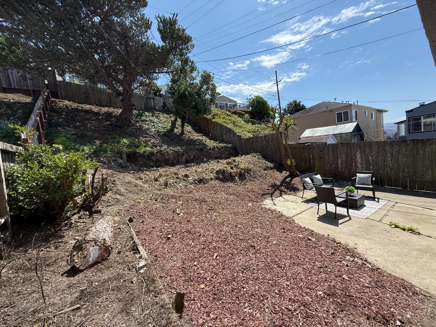 95 Clearview Drive Daly City, CA 94015 - Photo 17 of 21 a view of a backyard with sitting area and furniture
