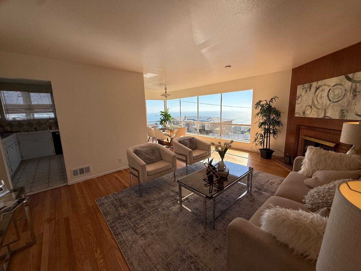95 Clearview Drive Daly City, CA 94015 - Photo 3 of 21 a living room with furniture and a large window