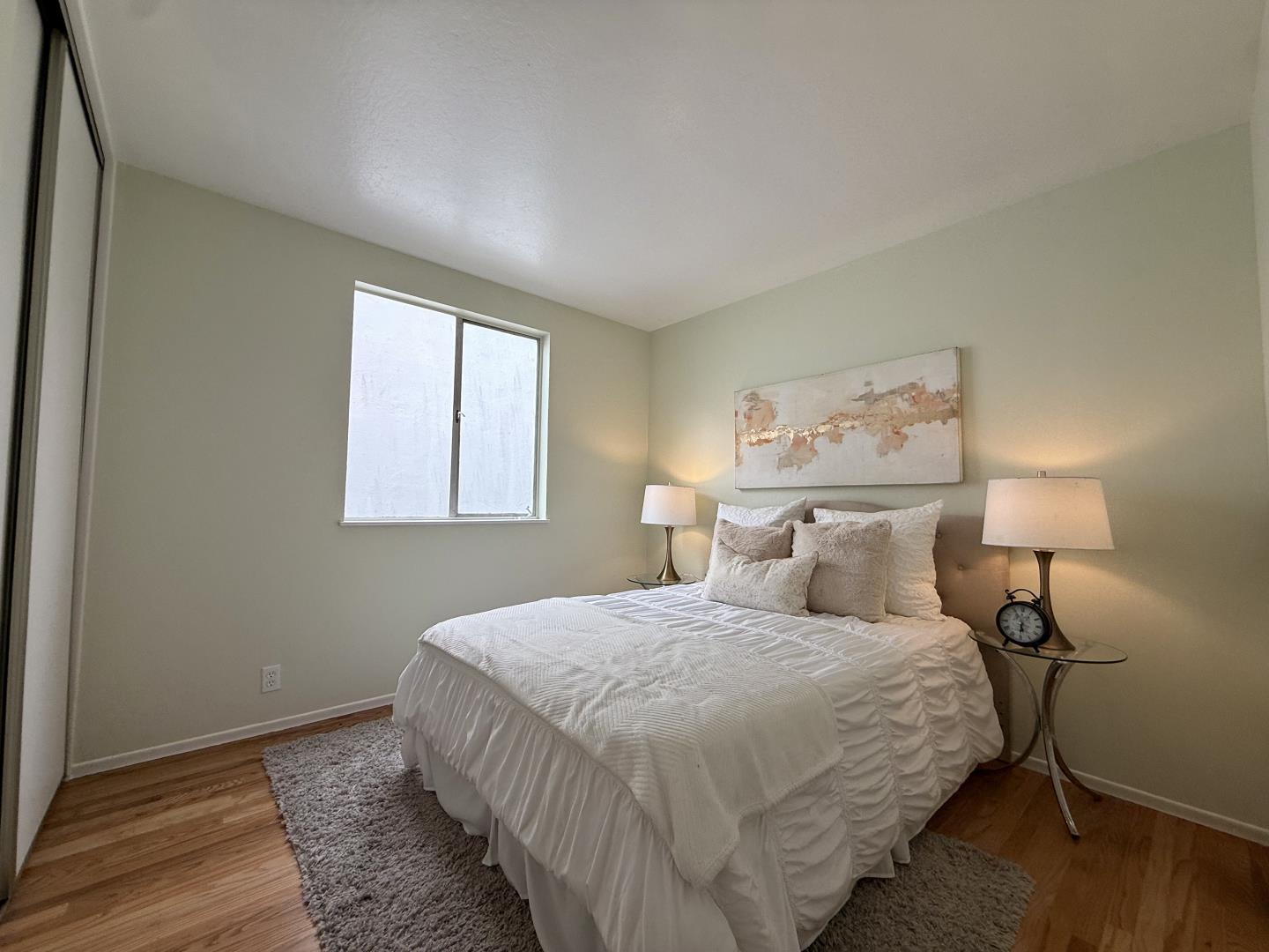 95 Clearview Drive Daly City, CA 94015 - Photo 9 of 21 a bedroom with a bed and a night stand