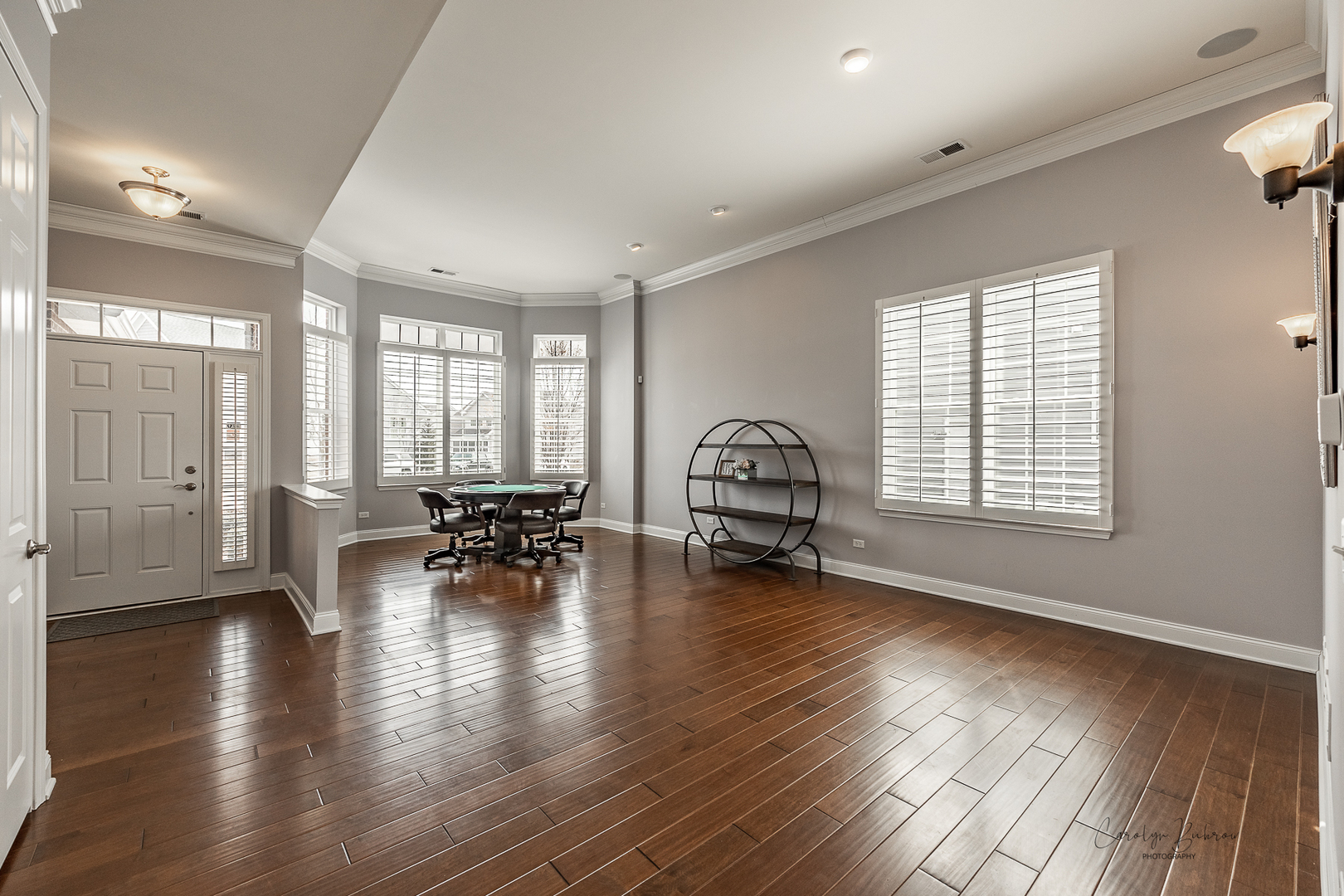 3870 Eagle Ridge Drive Elgin, IL 60124 - Photo 2 of 20 a living room with furniture and a wooden floor