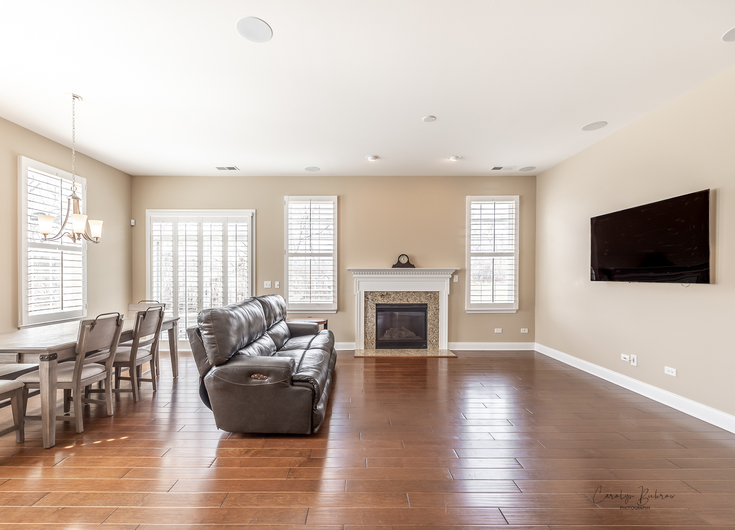 3870 Eagle Ridge Drive Elgin, IL 60124 - Photo 8 of 20 a living room with furniture fireplace and flat screen tv