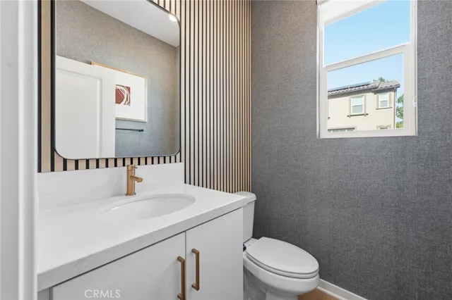 a view of kitchen with furniture and wooden floor