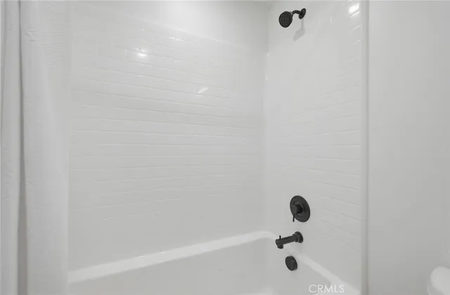 a view of a patio with couches chairs and a big yard