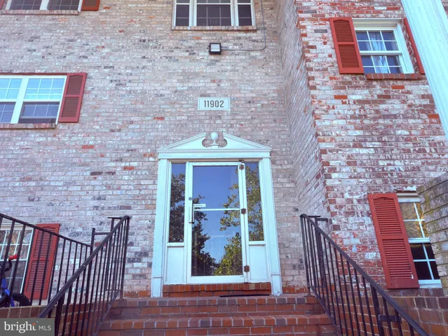 a view of a brick wall of the building
