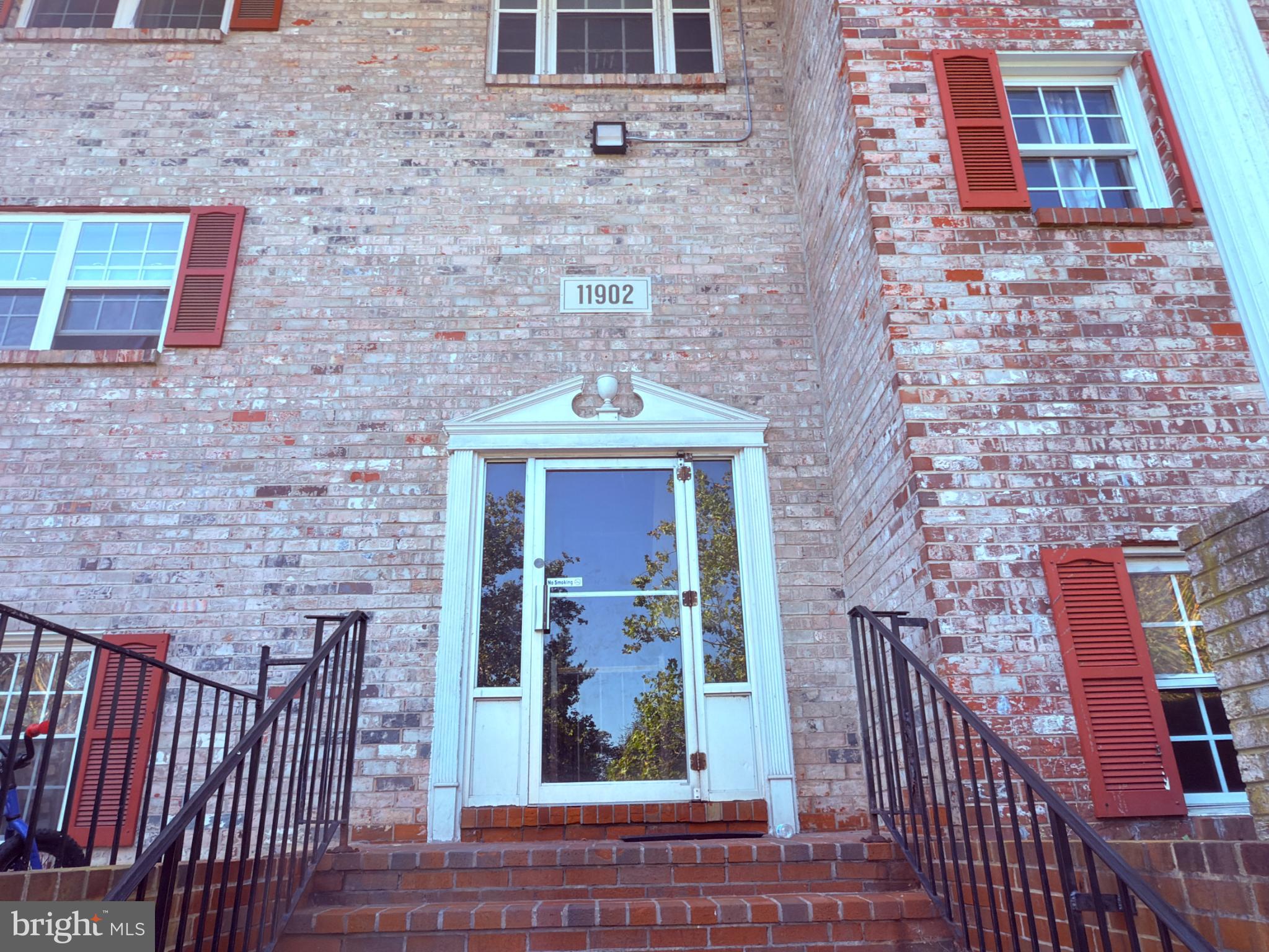 11902 A Tarragon Road, Unit A Reisterstown, MD 21136 - Photo 2 of 16 a view of a brick wall of the building