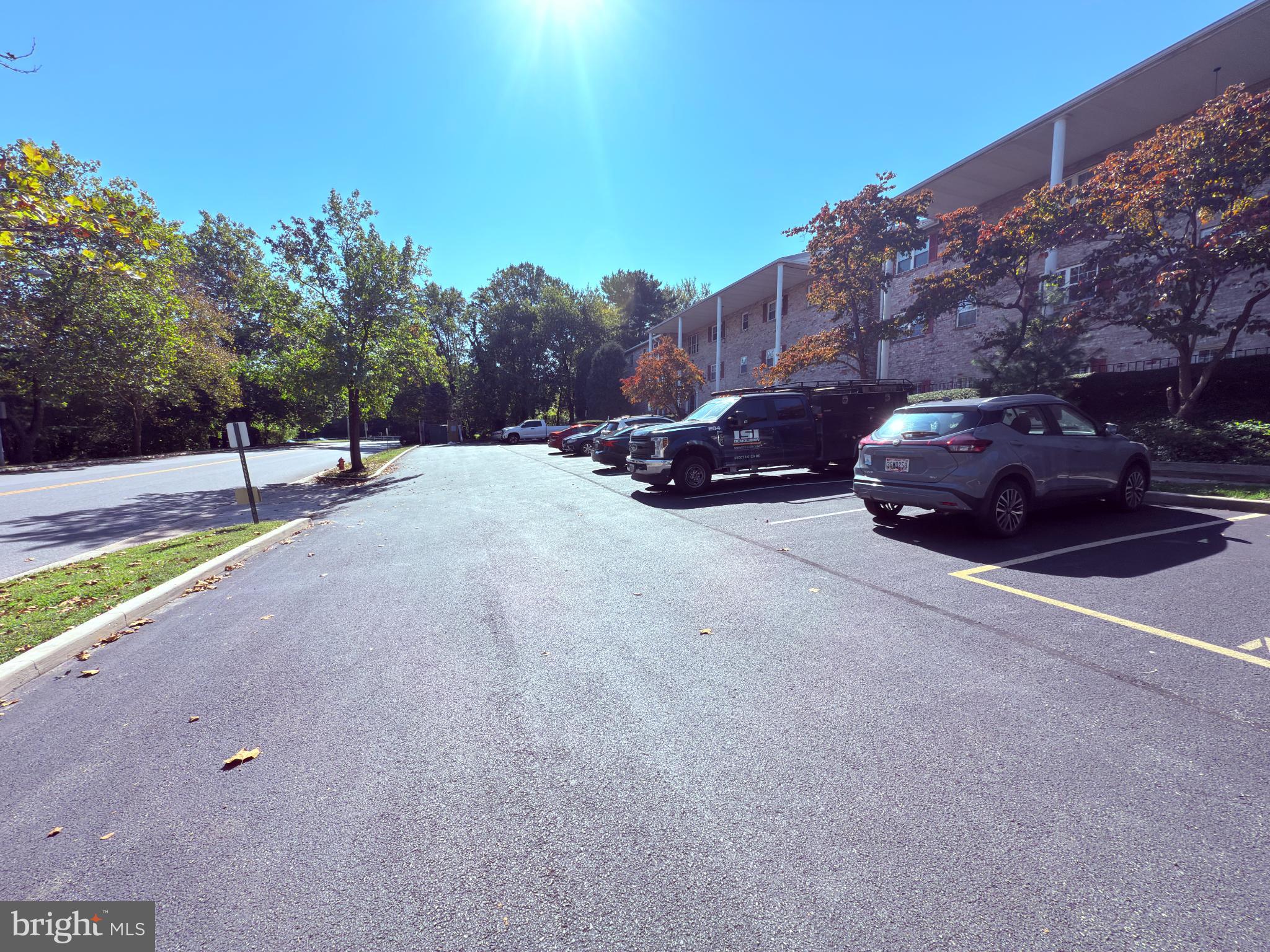 11902 A Tarragon Road, Unit A Reisterstown, MD 21136 - Photo 3 of 16 a view of street with parked cars