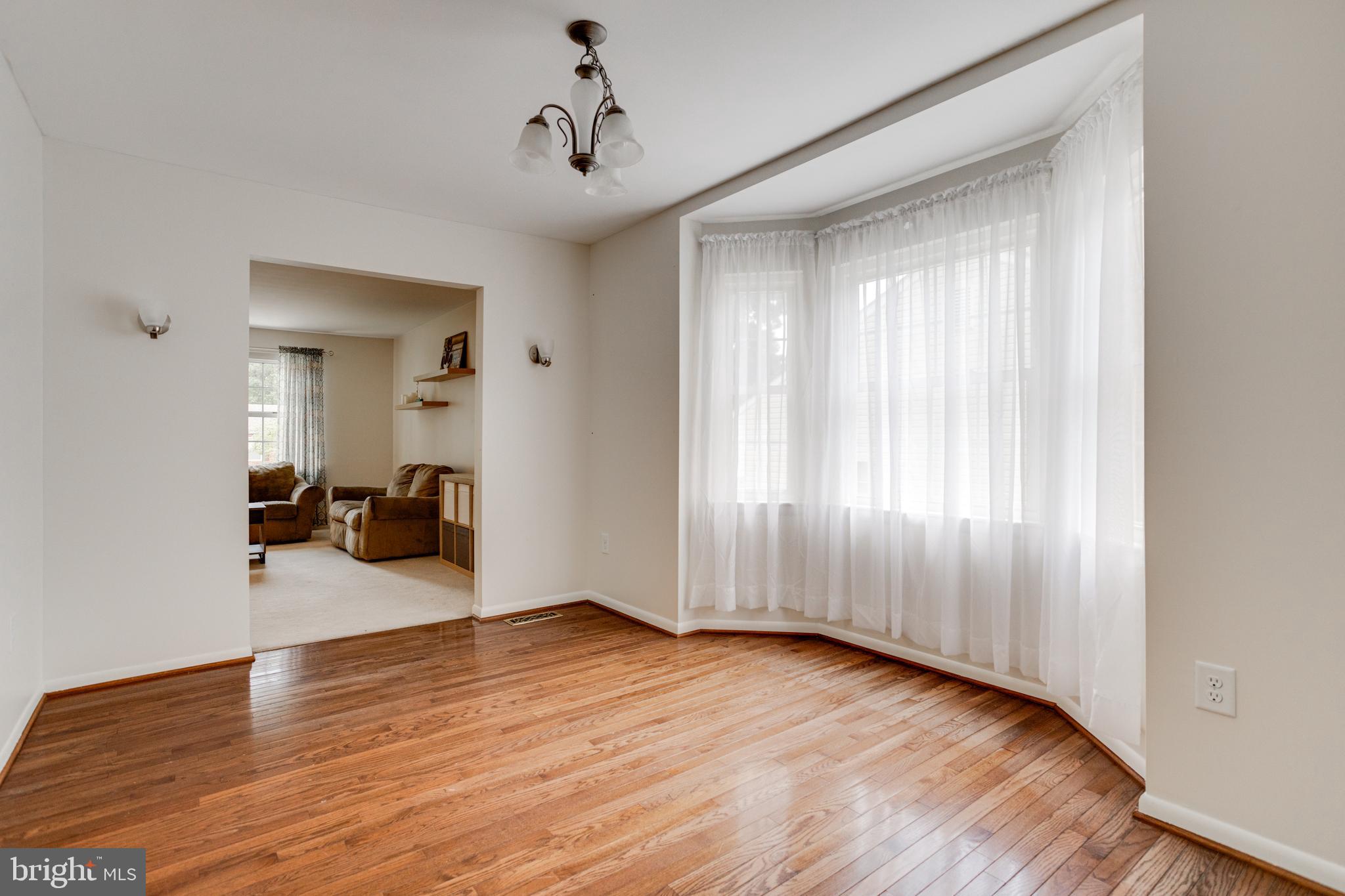 7704 Pecan Leaf Road Severn, MD 21144 - Photo 11 of 67 Dining Room with hardwood floors