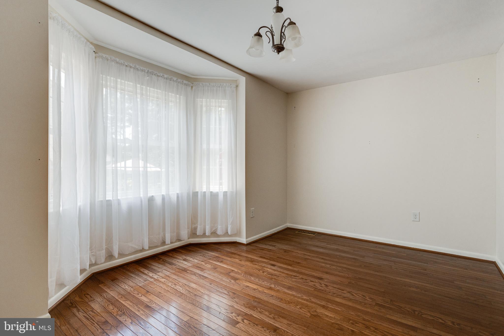 7704 Pecan Leaf Road Severn, MD 21144 - Photo 12 of 67 Dining Room with hardwood floors