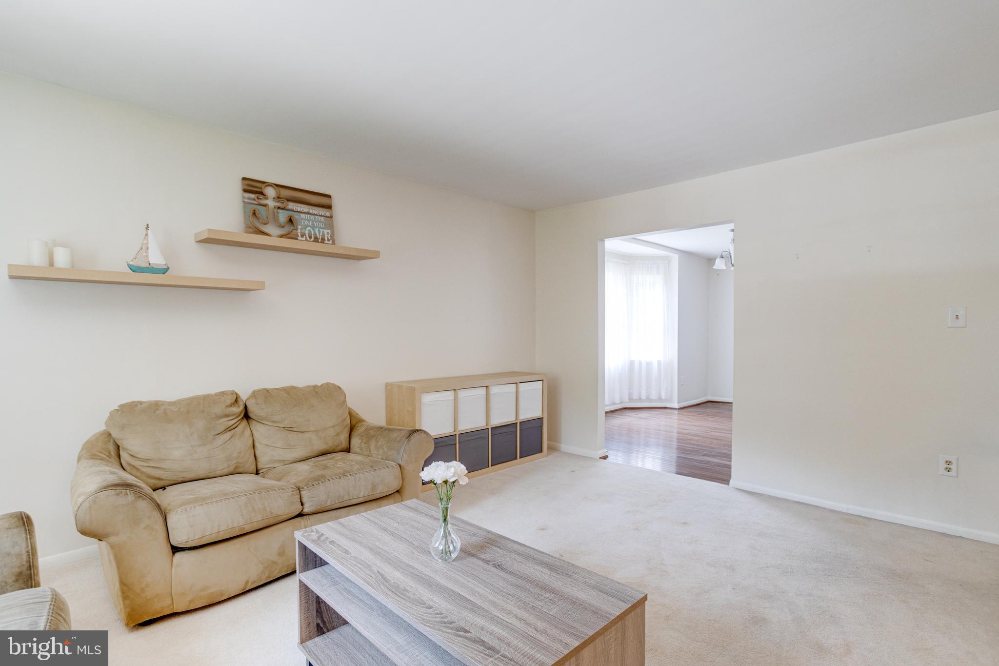 7704 Pecan Leaf Road Severn, MD 21144 - Photo 15 of 67 Living Room with wall to wall carpet