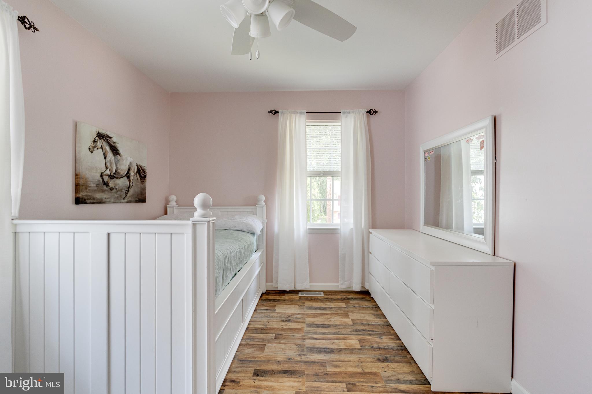 7704 Pecan Leaf Road Severn, MD 21144 - Photo 41 of 67 Bedroom 2 with hardwood floors