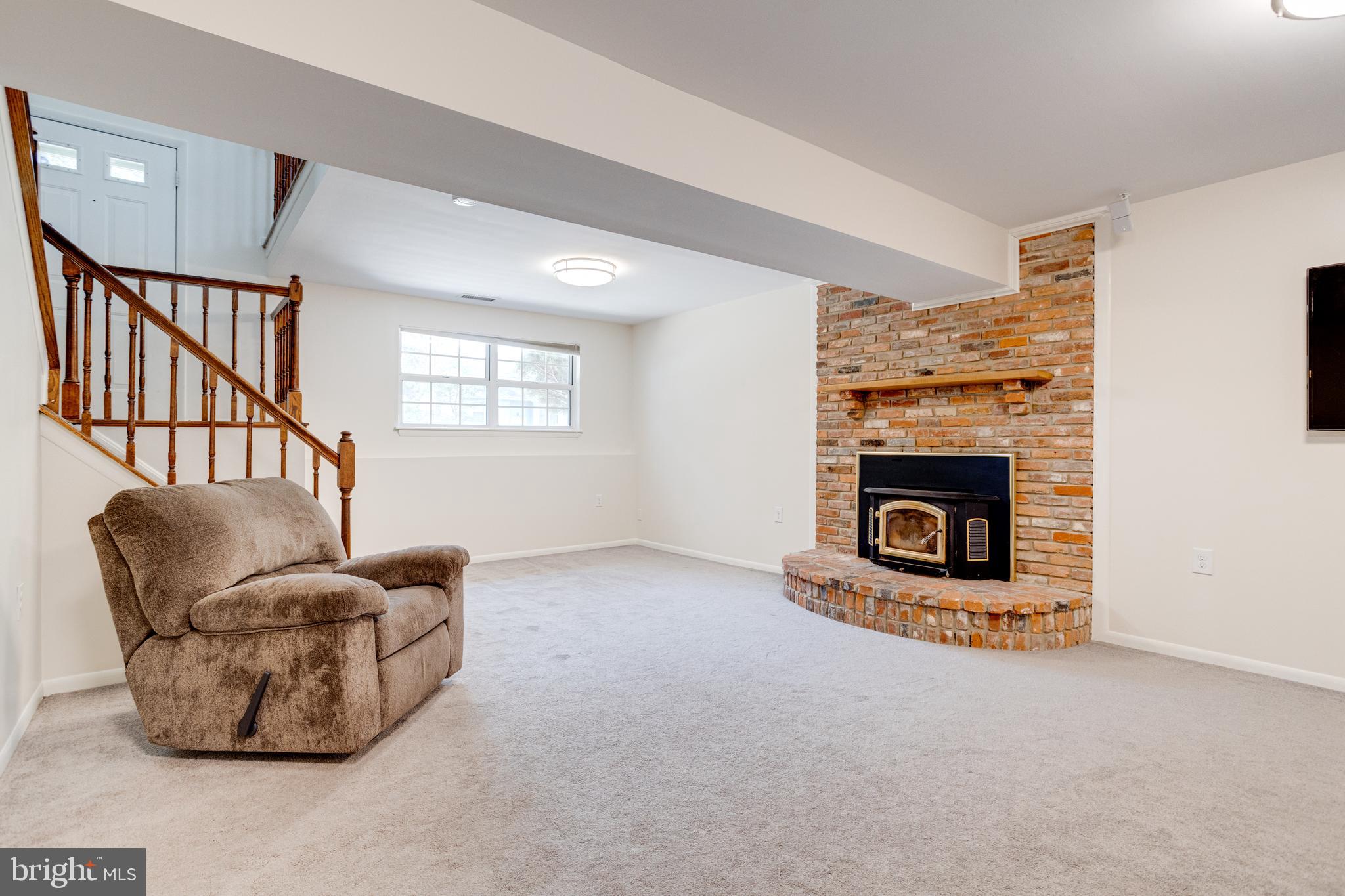 7704 Pecan Leaf Road Severn, MD 21144 - Photo 43 of 67 Lower level Family Room with fireplace!