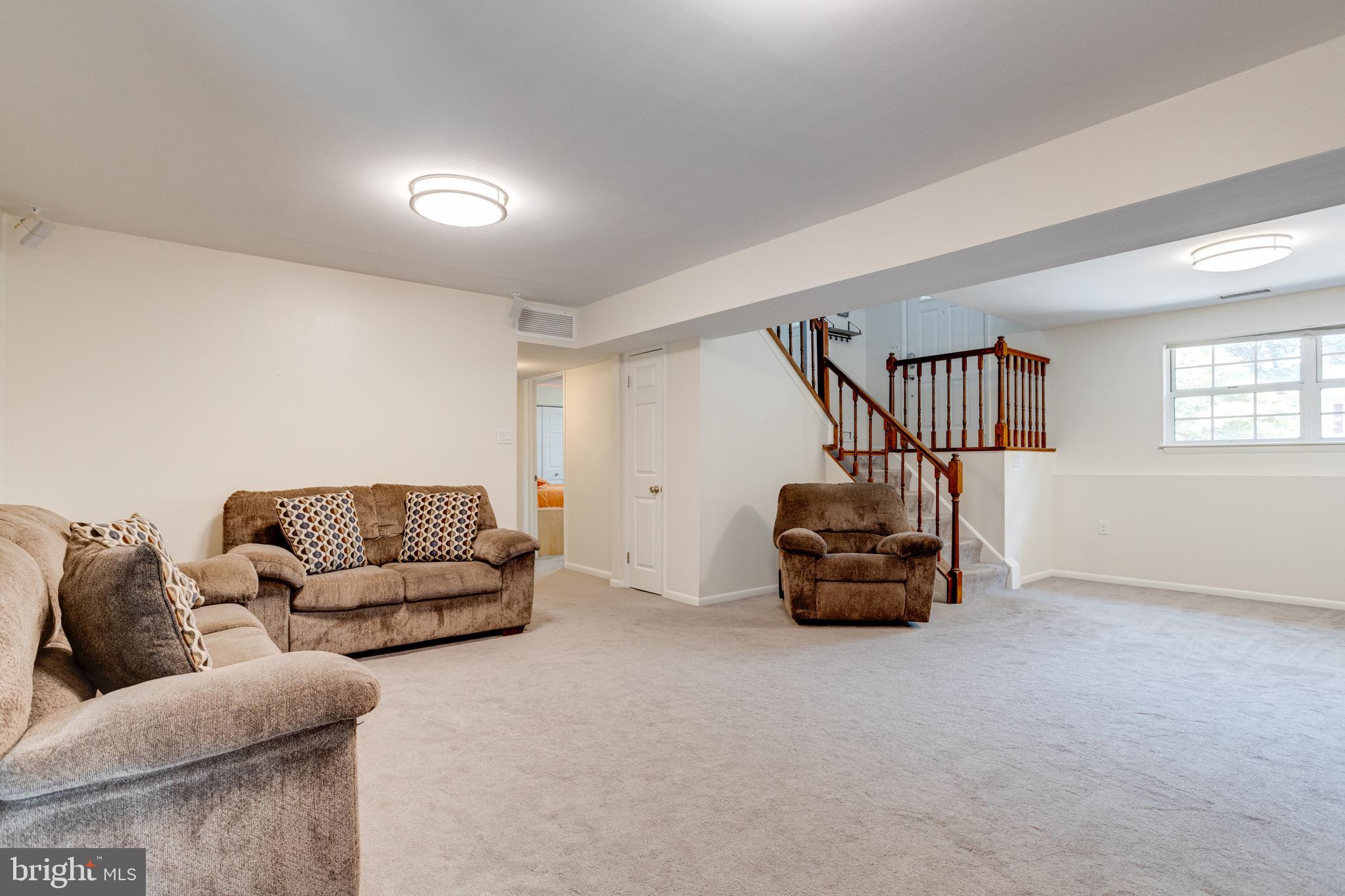 7704 Pecan Leaf Road Severn, MD 21144 - Photo 44 of 67 Lower level Family Room with fireplace!